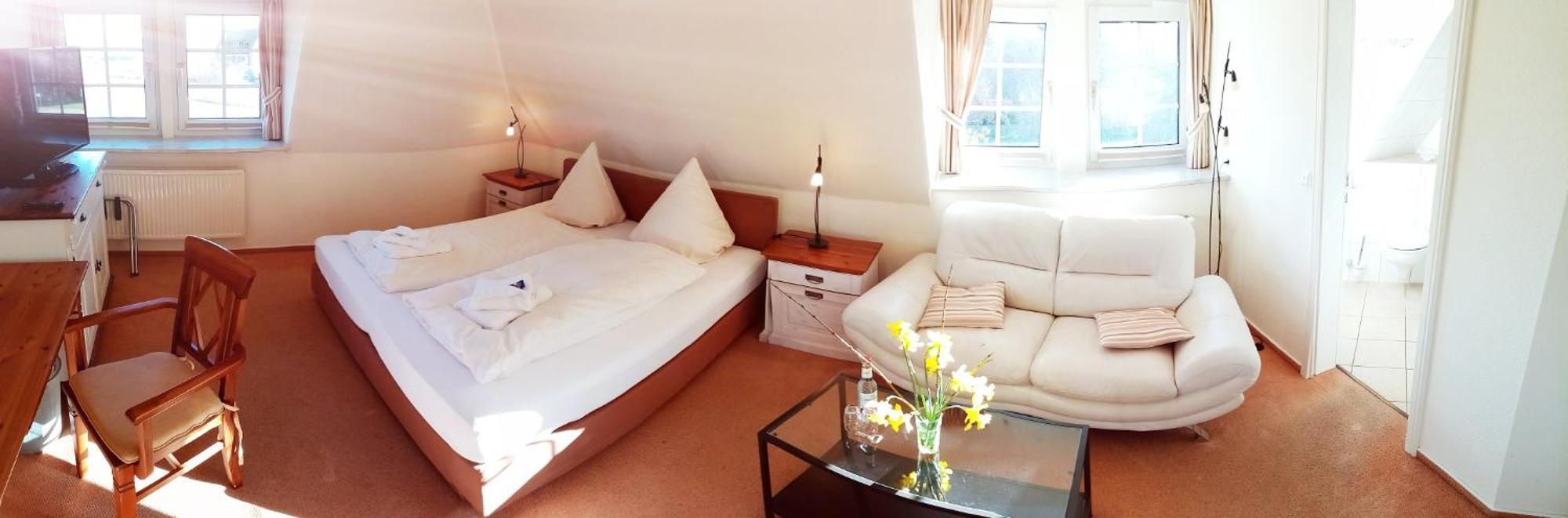 Inselhotel Kapitaen Tadsen / Amrum Nebel Bilik gambar